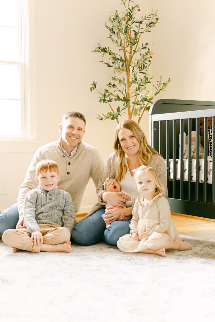 family of 5 pose for photos in fairborn ohio, professional newborn photography 