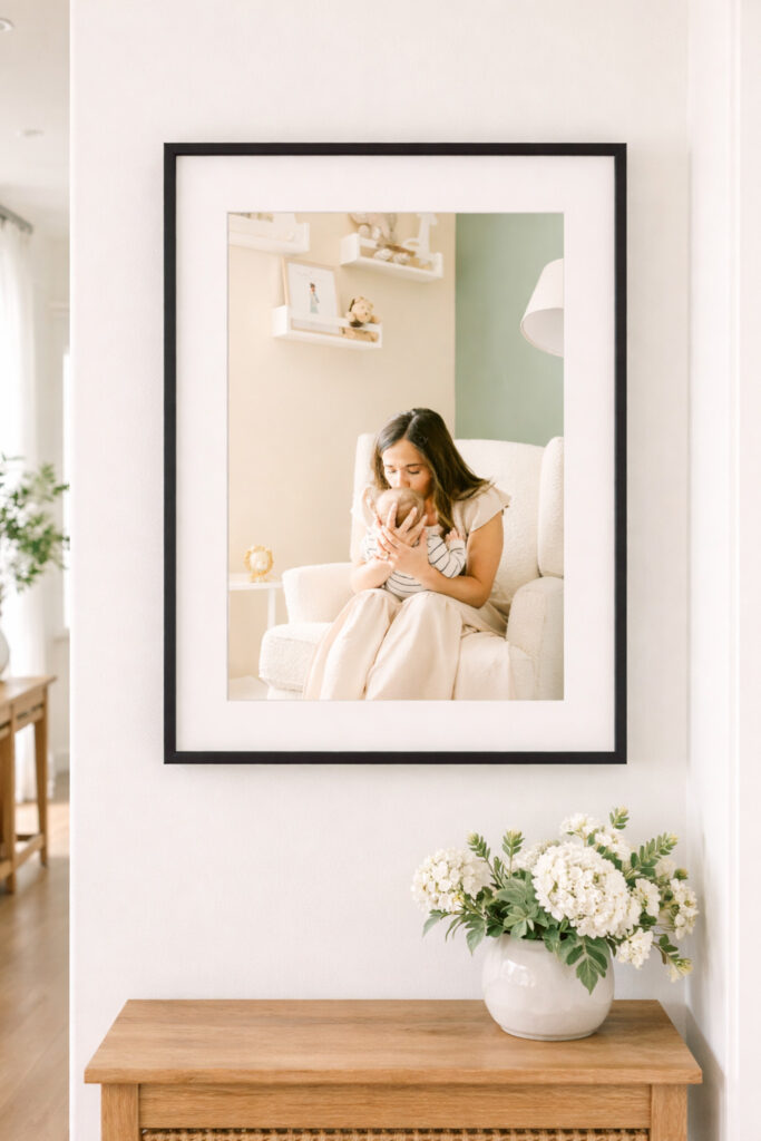 mom kissing baby in custom framed photo from a full service newborn photographer in Cincinnati Ohio