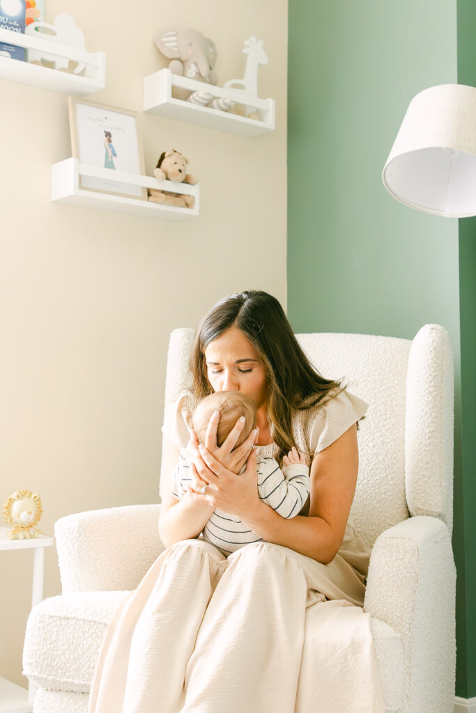 mom holding newborn baby boy in newborn session in dayton ohio